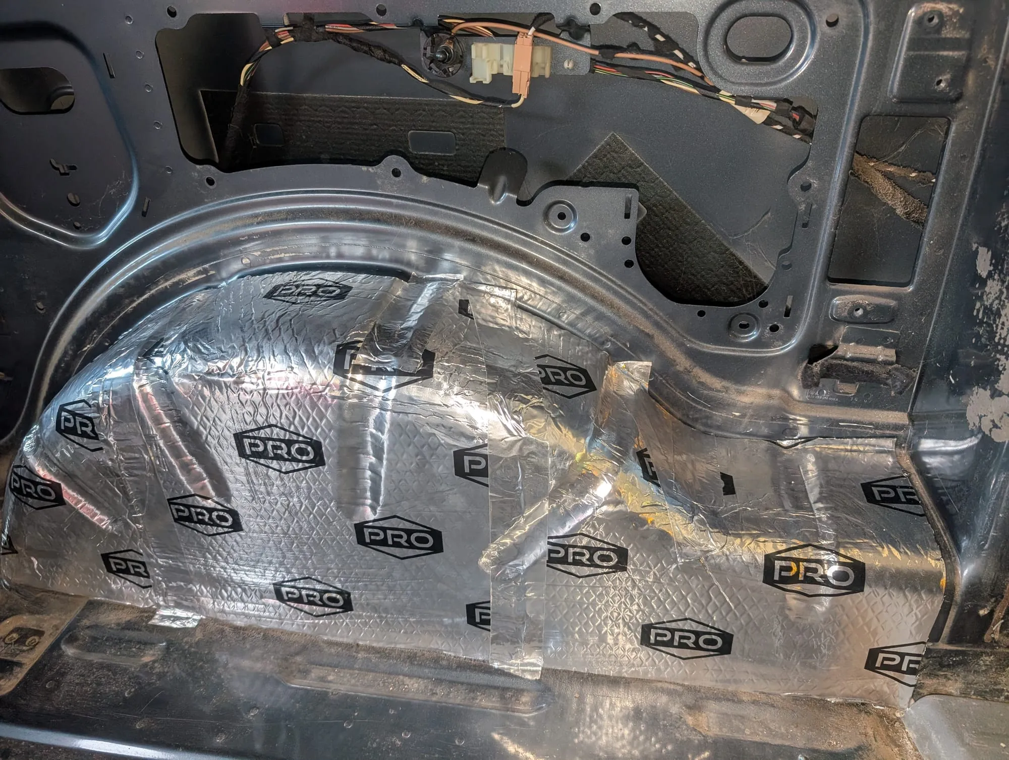 Sound deadening fitted inside a van door
